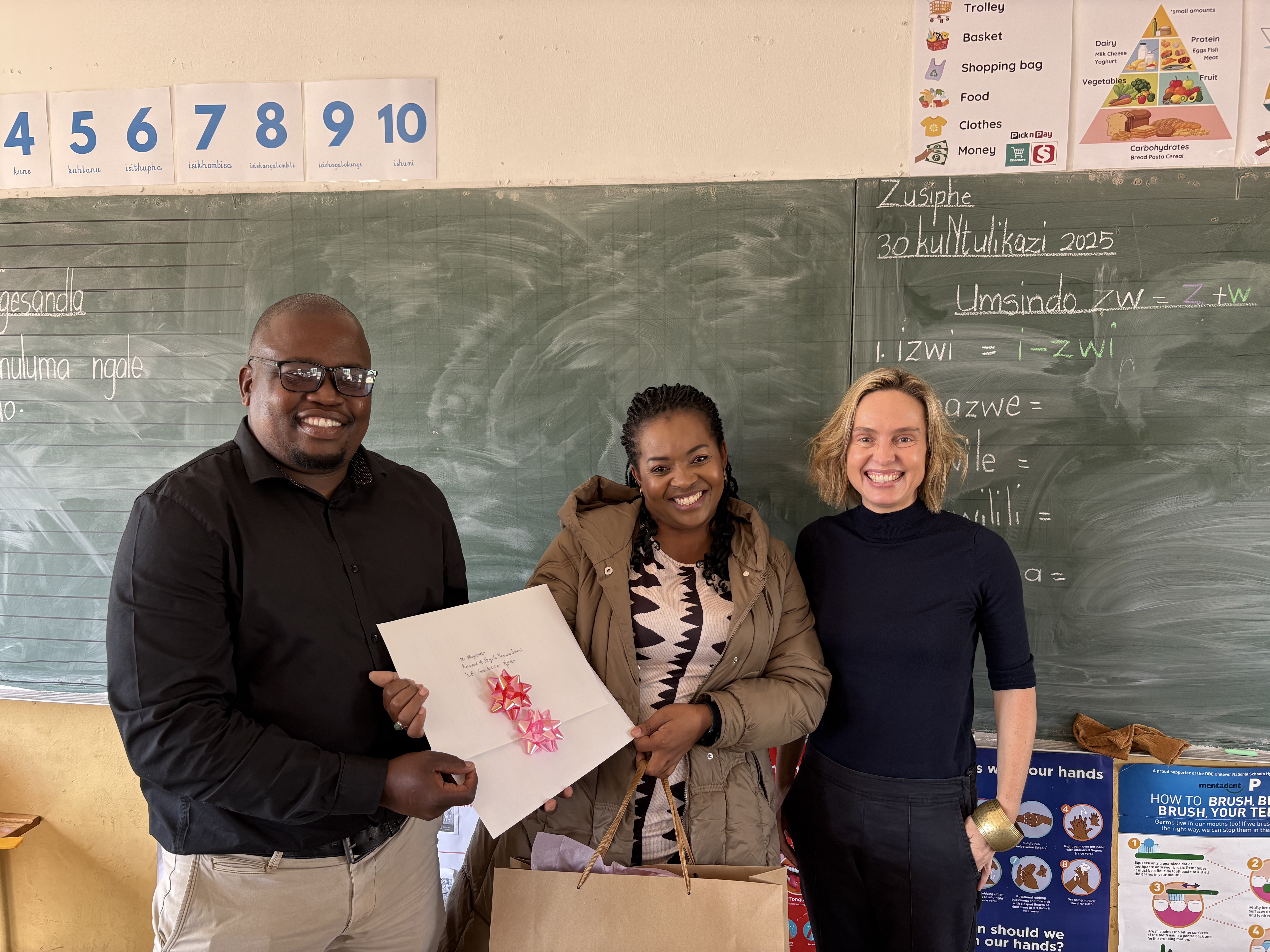 Kole with Busisiwe Mvulana in classroom